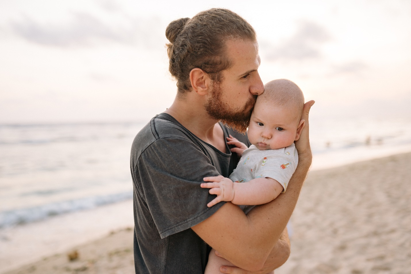 a man holding a child